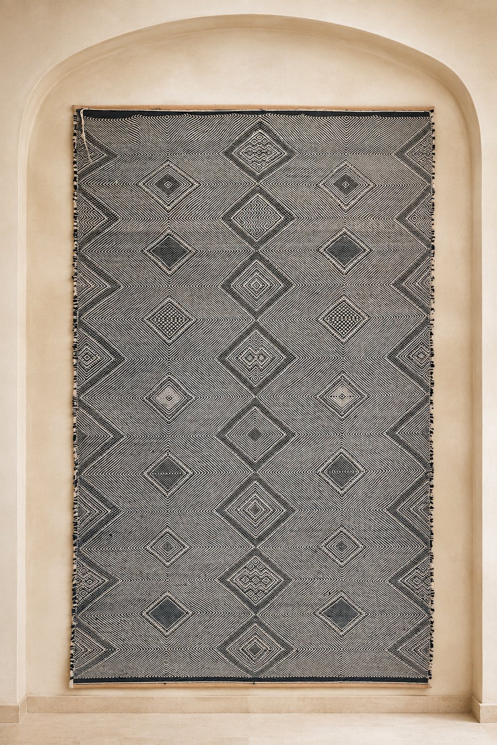 Ijoukak Moroccan flatweave rug with large black and ivory twill diamond medallions